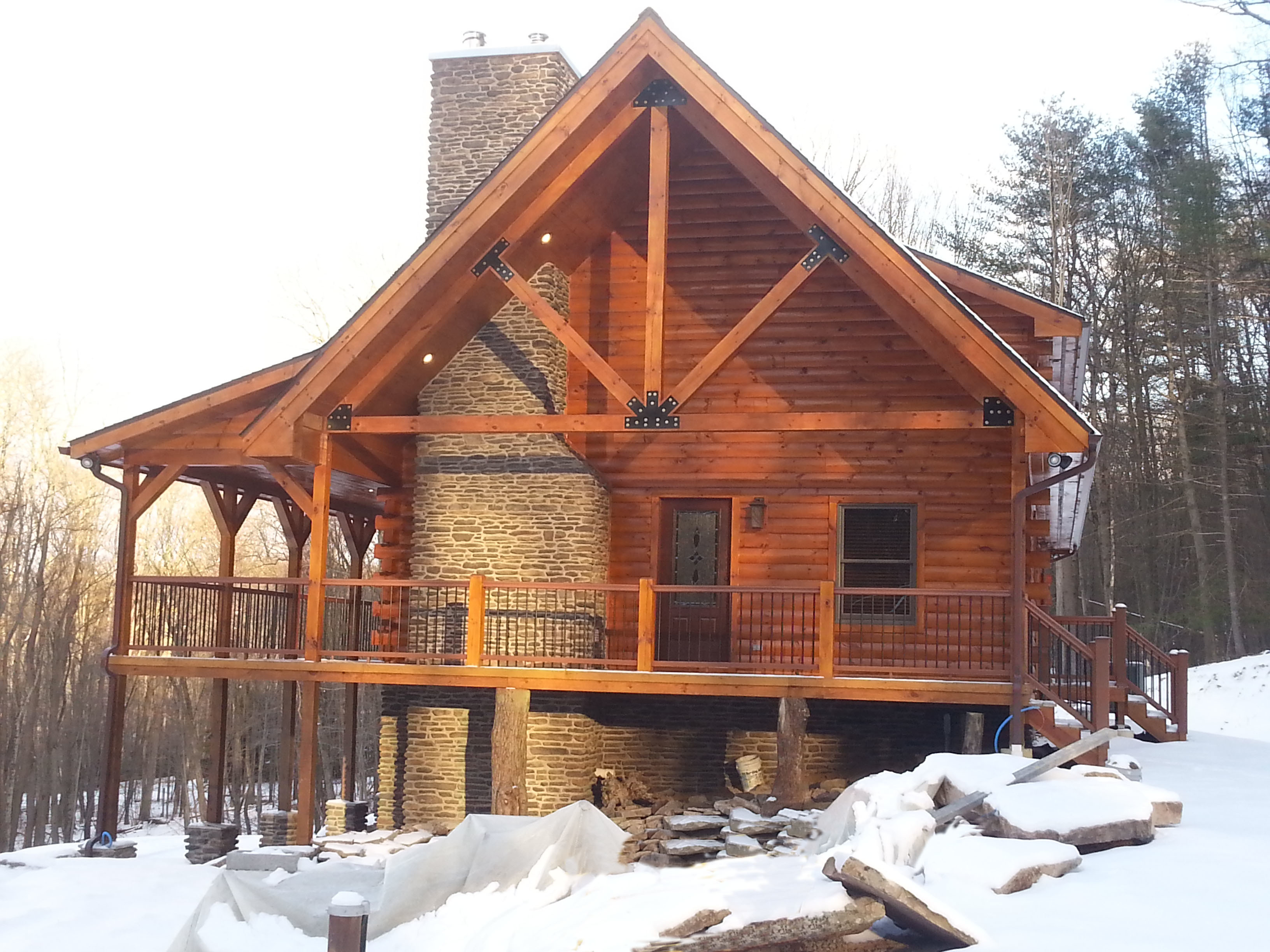 modified Valley View with King Post Truss and massive stone fireplace, Timberhaven Log Homes, Valley View, floor plan ideas, complete customization, laminated logs, engineered logs, kiln dried logs, design services, Pennsylvania, log homes, log cabins, log cabin kits, log cabin homes, log home packages