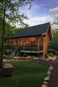 small log home in wooded setting, engineered log home, differences, log vs. timber frame homes, different home design options, log homes, log cabin homes, log cabins, post and beam homes, timberframe homes, timber frame homes, laminated logs, engineered logs, floor plan designs, kiln dried logs, log homes in PA, Timberhaven Log Homes, Timberhaven Log & Timber Homes