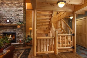 log railing and balusters, Exposed Heavy Timber Stairway, Half log handcrafted stair systems, custom stairs in log home, stair systems, wooden stair systems, custom stair systems, custom stairs, wooden stairs, Timberhaven stair options