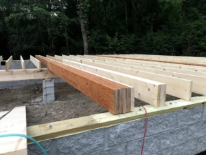 girder beam and floor joists for foundation, new model log home, foundation, crawlspace, foundation for new log home, log home foundation