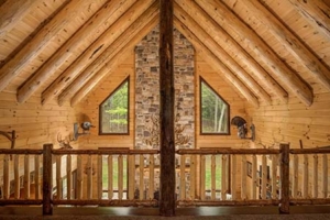 high ceiling with rafters and logs, Custom Log Home Features, log homes, log home living, timberhaven, log and timber home living