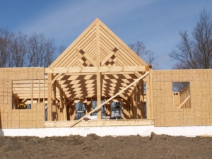 hybrid home under construction, Timberhaven, comparing log and timber home estimates