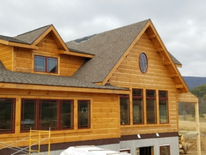 log home under construction, Timberhaven, comparing log and timber home estimates