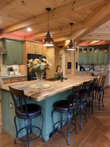 Kitchen with contrasting cabinets and large island, Custom Log Home, Timberhaven, Experience Luxury Living, Log Home