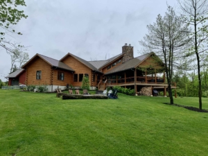 Custom Log Home with spacious yard and fireplace, Timberhaven, Experience Luxury Living, Log Homes