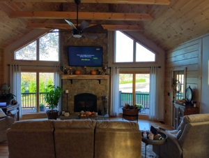 log home great room with windows, single-level log home, Timberhaven, log homes, single-level home design